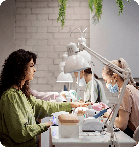 J'Adore Nails staff performing professional manicure and nail services in Cherry Hill